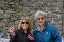 JILLY Evans and Heather Ashton collecting stones, kindly donated by Clive Richards of Mid Wales Stone who has donated the stones for 10 years.