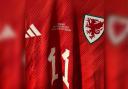The signed Bale Wales shirt.