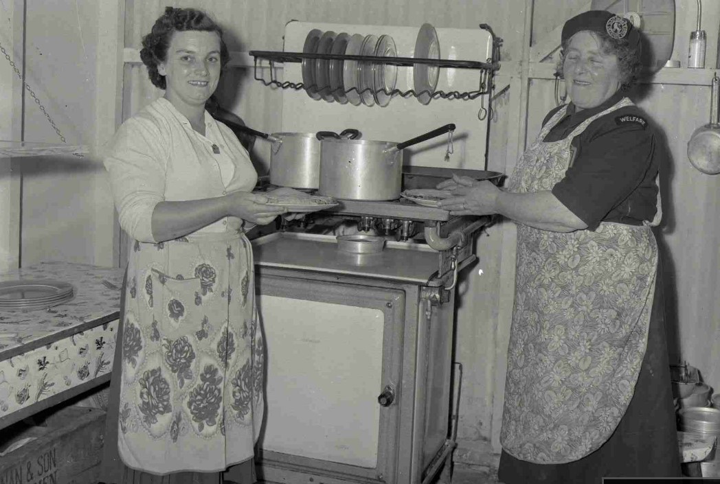 Women with saucepans - an image from the Anglesey archives collection, possibly the 1950s. Do you know what the story was or who the people are? Black and white Burrows images Courtesy of Anglesey Archives