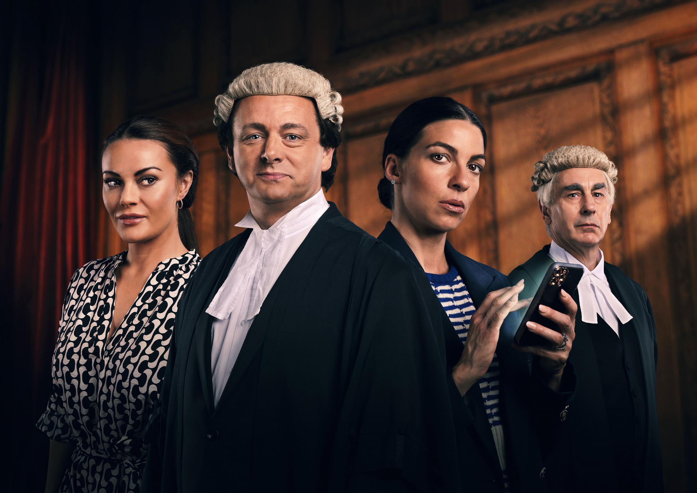 Chanel Cresswell as Coleen Rooney, Michael Sheen as David Sherborne QC, Natalia Tena as Rebekah Vardy and Simon Coury as Hugh Tomlinson QC in the upcoming series Vardy v Rooney: A Courtroom Drama, a dramatisation of the 2022 High Court battle that
