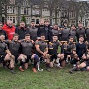 Holyhead celebrate their outstanding win at Cardiff Saracens