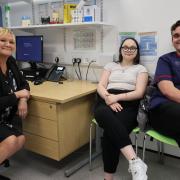 GP Dr Jodie Walker and ANP Dominic Marten with Jorja during her return visit to the practice to thank the staff who saved her.