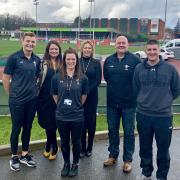 Rachel Taylor (WRU Regional Co-ordinator), Sara Williams (Gr?p Llandrillo Menai learner services project manager), Hannah Hughes (rugby engagement officer), Marc Roberts (WRU regional manager) and Allan James (WRU regional co-ordinator)