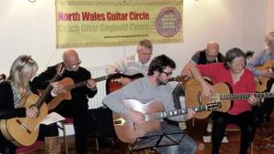 Guitar circle to hold mental health fundraiser in Menai Bridge
