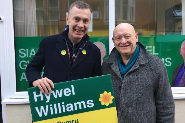 During a visit to Bangor over the weekend, Adam Price addressed the party faithful and took part in the campaigning effort. Pictured with Arfon candidate, Hywel Williams. Image - Plaid Cymru.