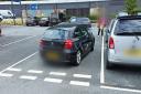 The car left parked on a road in Aldi's car park