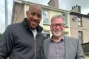 Dion Dublin with a Dafydd Hardy Estate Agents member of staff.