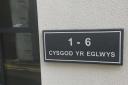 The name plate for Cysgod yr Eglwys