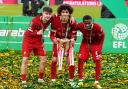 Liverpool's Lewis Koumas, Jayden Danns and Trey Nyoni with the trophy after winning the Carabao Cup final at Wembley Stadium, London.