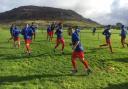 Bangor City warming up before their cup game at Nefyn United