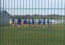 Bangor City players snapped during their impromptu training session