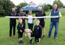 Back (L-R): RGC general manager Alun Pritchard, player Jessie Williams, Sharon Jones, RGC head coach Ceri Jones, and Cartrefi Conwy Group chief executive Andrew Bowden. Front (L-R): brothers Harry and Oliver Groves, aged six and 10.