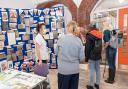 International passengers from the cruise ship Carnival Pride with Kirsty Baker of Isle of Anglesey County Council’s Regeneration Team based at the Market Hall.