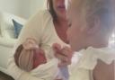 Video grab of the moment 22-month-old Effie Beau Owen met her newborn younger sister, Indie Summer Owen, for the first time ever.