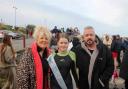 Macy with Newry Beach New Year's Day Dip organizers Islwyn Owen and Shan Williams