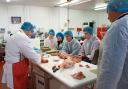 Students making ice cream as part of a dairy workshop at the Food Technology Centre in Llangefni