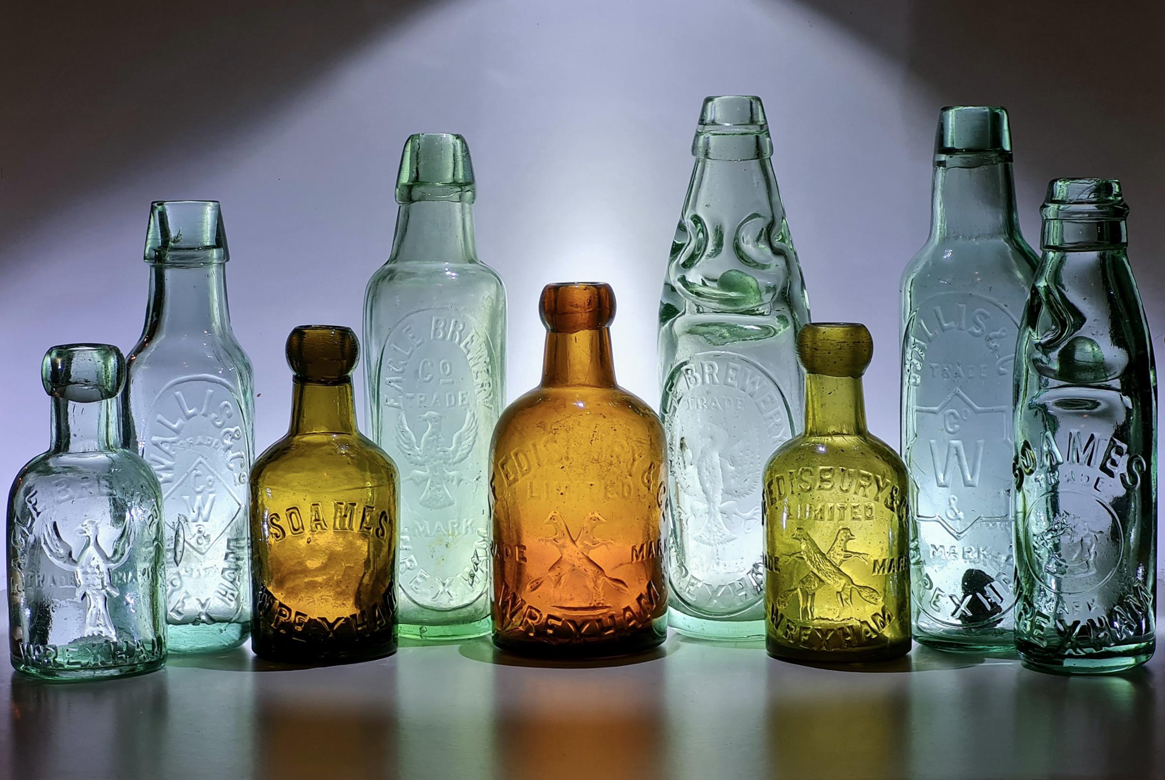 Some of Adam Mercers favourite glass mineral water bottles from his collection.
