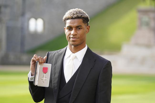 Marcus Rashford received his MBE for services for vulnerable children (PA)
