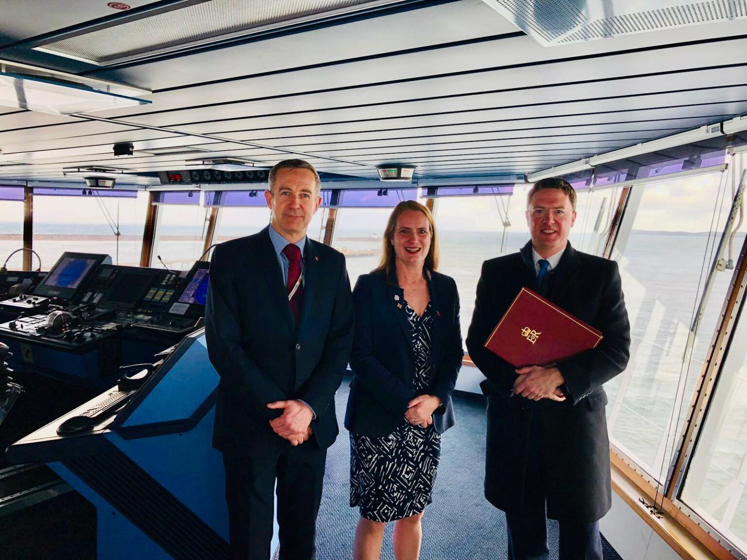Minister Courts with Virginia Crosbie and Head of UK Ports Ian Davies on board the Stena Adventurer.