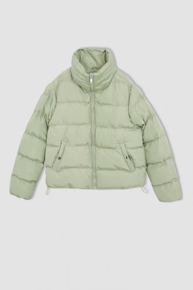North Wales Chronicle: Green basic zippered puffer jacket. Credit: Defacto