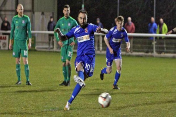 Bangor City (blue) will not return to action this season