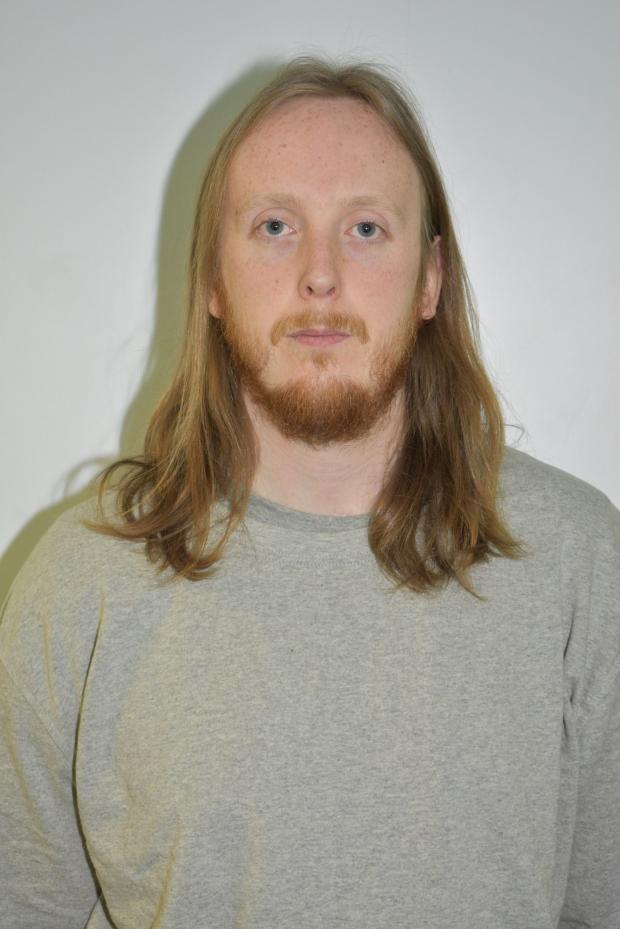 North Wales Chronicle: Undated Counter Terrorism Policing North East handout photo of Samuel Whibley, 29, of Derwen Deg, Menai Bridge, Anglesey, was found guilty of the encouragement of terrorism, and disseminating a terrorist publication. 