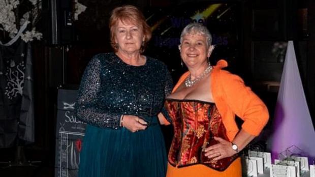 North Wales Chronicle: Anne Arkle (left) receiving her award, with Jane Grayer of the Best of Welsh Business Awards. Photo: Anne Arkle
