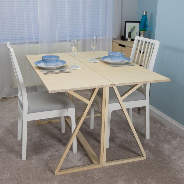 North Wales Chronicle: A bespoke folding dining table which also works as a home office desk, designed specifically for an individual customer. Photo: Bobbi Barnwell