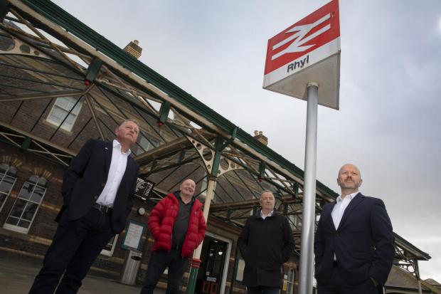 North Wales Chronicle: (L/R) Adam Williams, Sean Taylor, Jim Jones and Ashley Rogers at Rhyl Train station. 