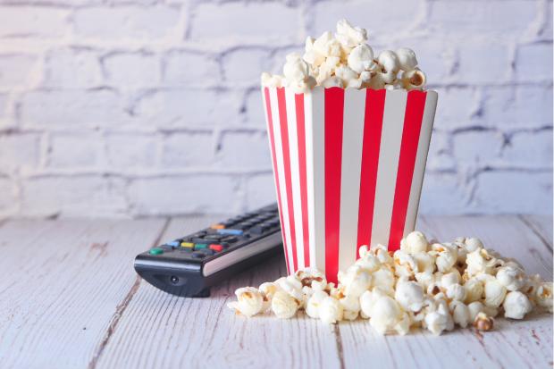 North Wales Chronicle: Popcorn and a TV remote (Canva)