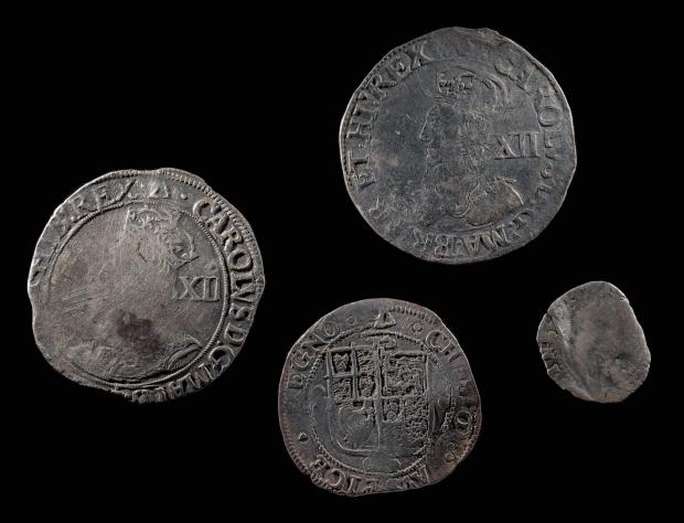 North Wales Chronicle: Four silver coins of Elizabethan and Stuart dates (Treasure Case 20.14). Photo: Amgueddfa Cymru – National Museum Wales