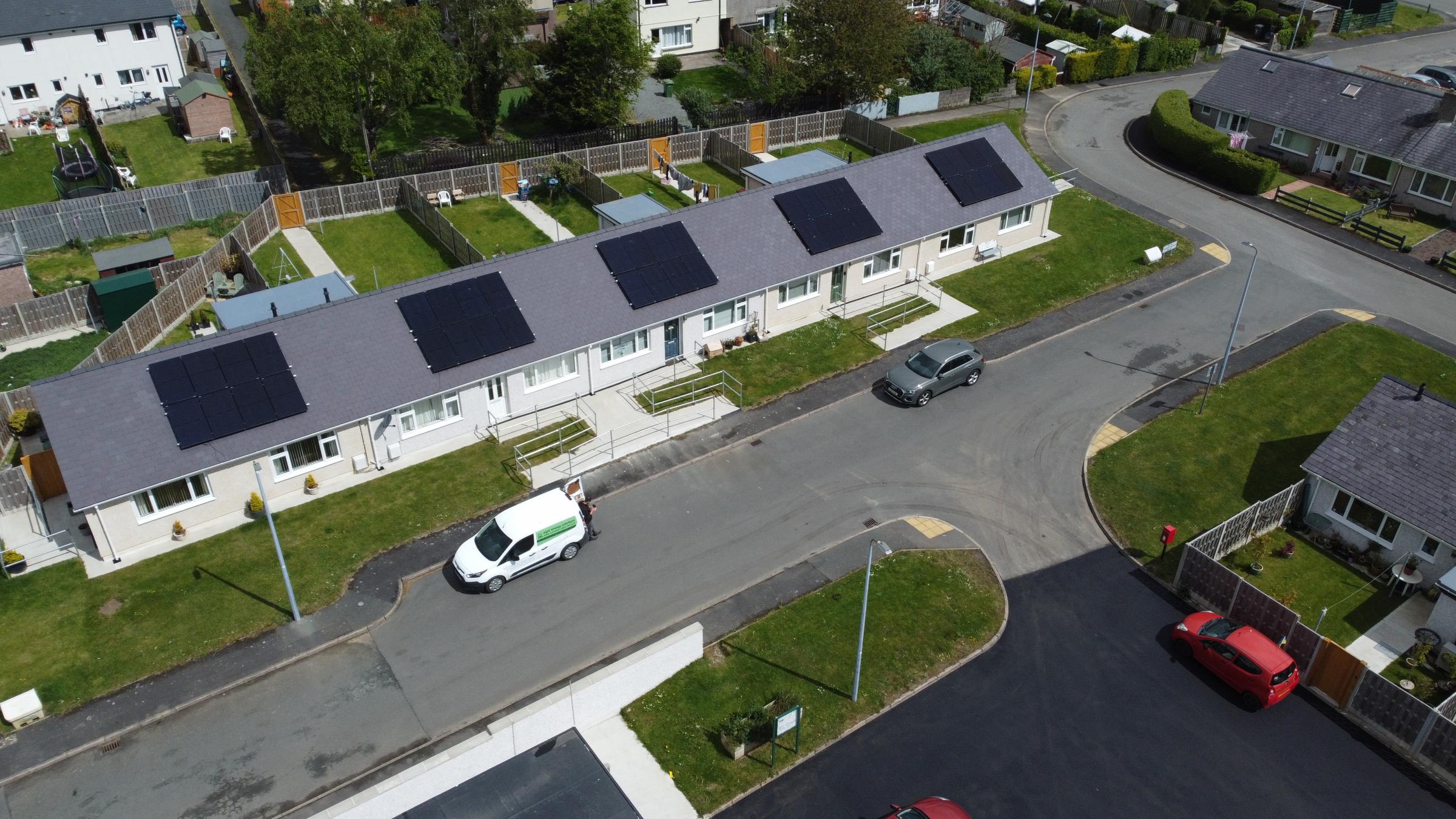 The drone image shows the council house Improvements which include solar panels on the roof of homes at Pont Y Brenin, Llangoed