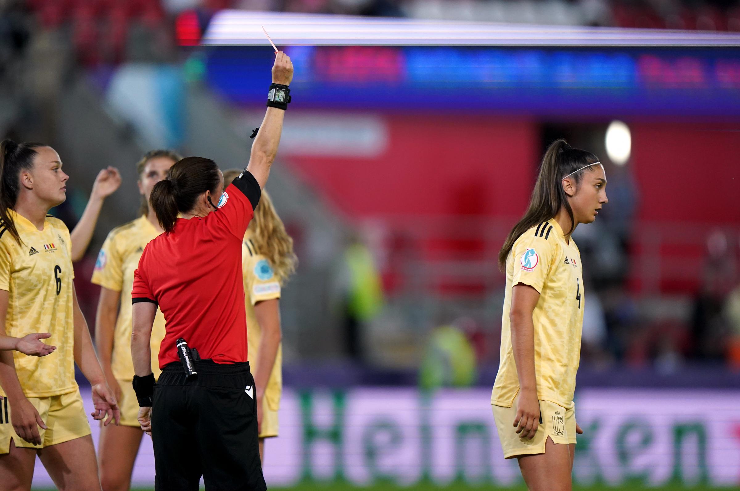 Referee Cheryl Foster shows a red card to Belgiums Amber Tysiak during the UEFA Womens Euro 2022 Group D match at the New York Stadium, Rotherham.