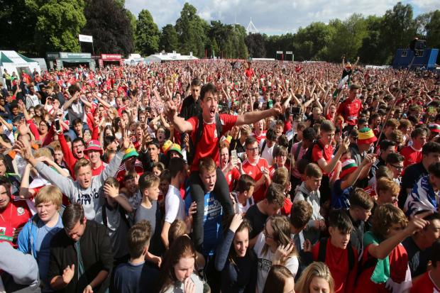 Welsh football supporters at the Cardiff fanzone during Euro 2016. A campaign to ensure that fanzones are provided for the 2022 World Cup is gathering pace.  Photo: Huw Evans Picture Agency