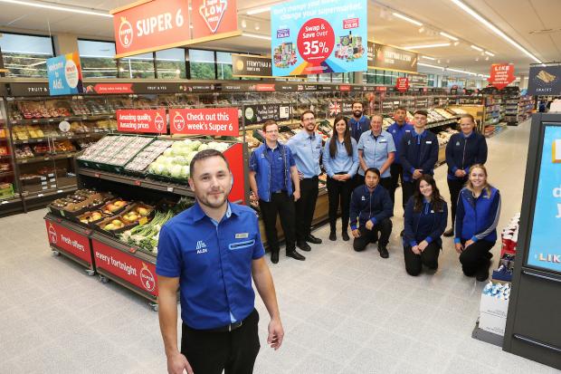 North Wales Chronicle: Some of the team at the new Aldi store in Bangor. Photo: Keith Freeburn