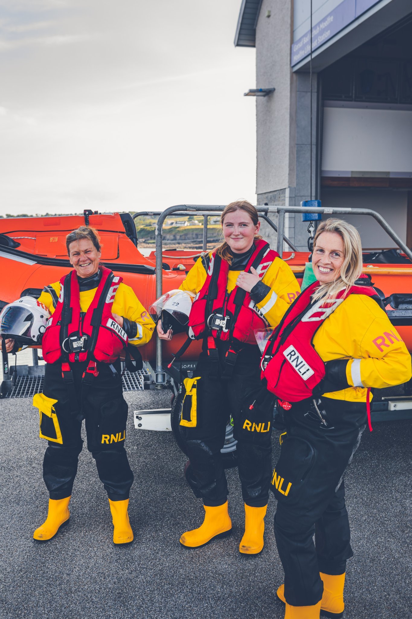 Dwynwen, Ellie and Georgi made history at Moelfre lifeboat station by being on the first ever shout involving an all-female crew. Photo: Will Aron