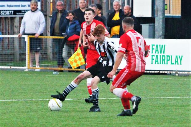 Action from Buckley Town's 1-0 win at Cefn Druids. Picture: Mike Plunkett