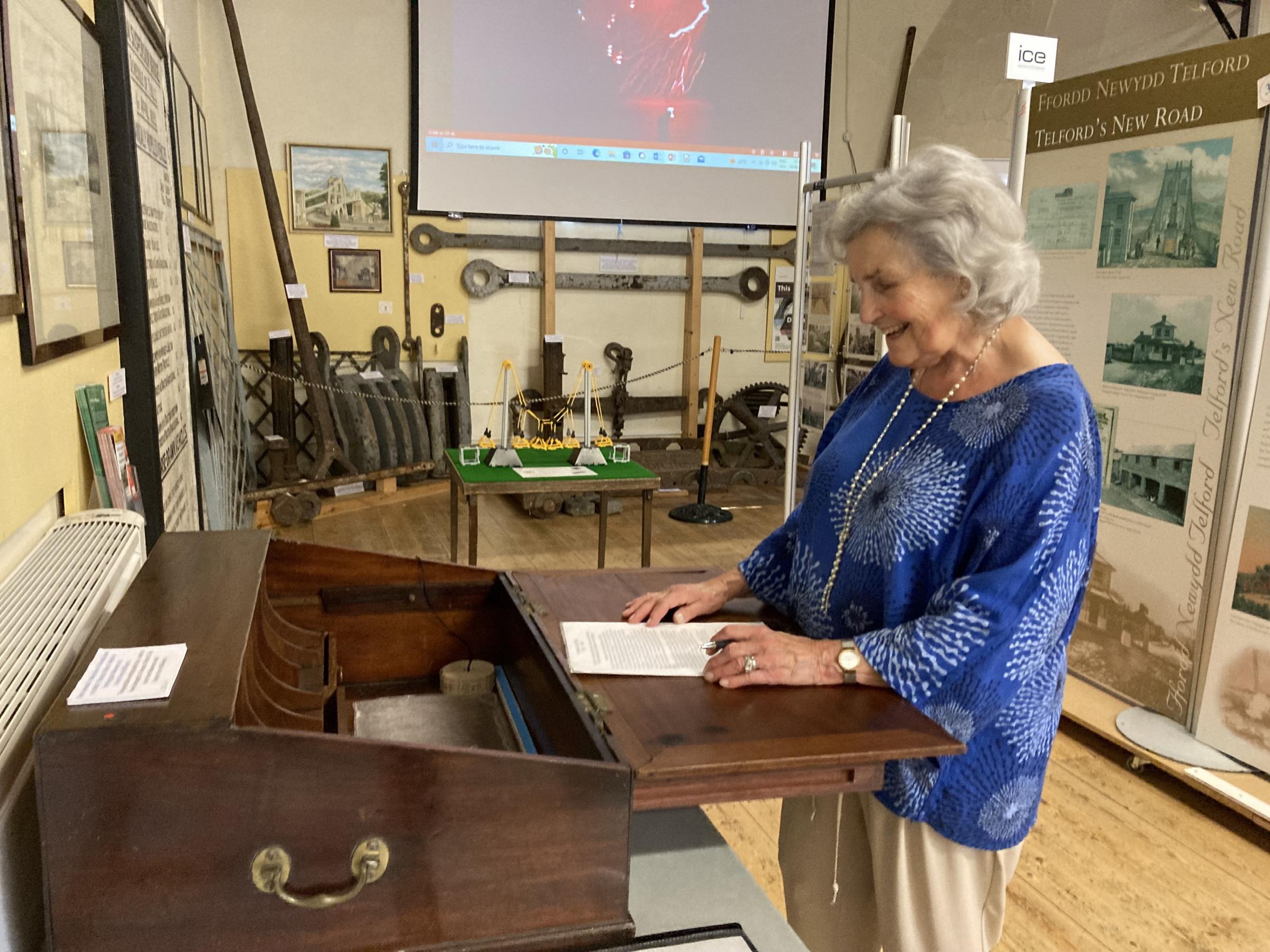 Jean Baker founder of the Menai Heritage Centre with what is believed to be Thomas Telfords writing desk (Picture Dale Spridgeon)
