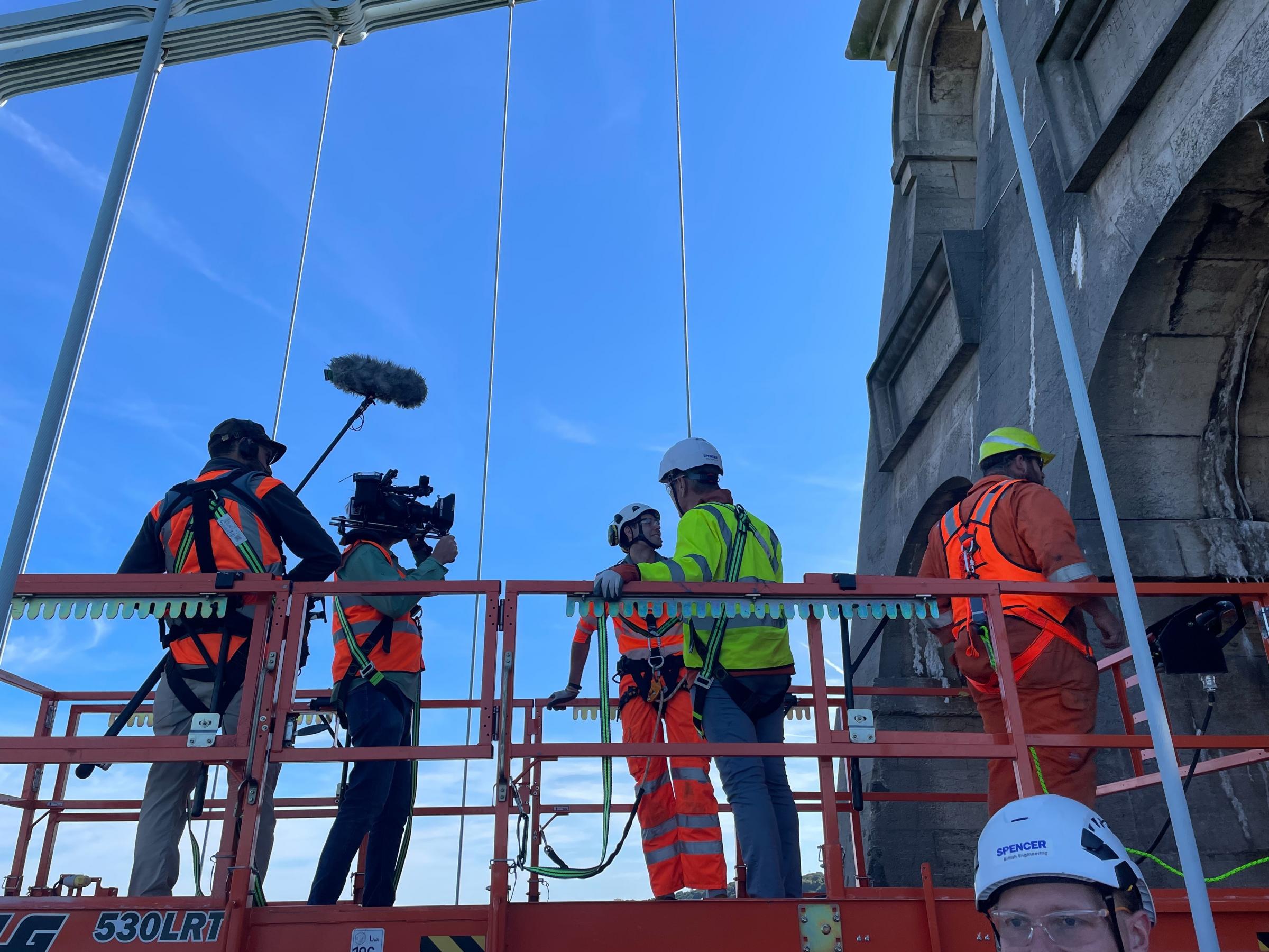 Michael Portillo being filmed on Menai Suspension Bridge (Picture: John Cole)