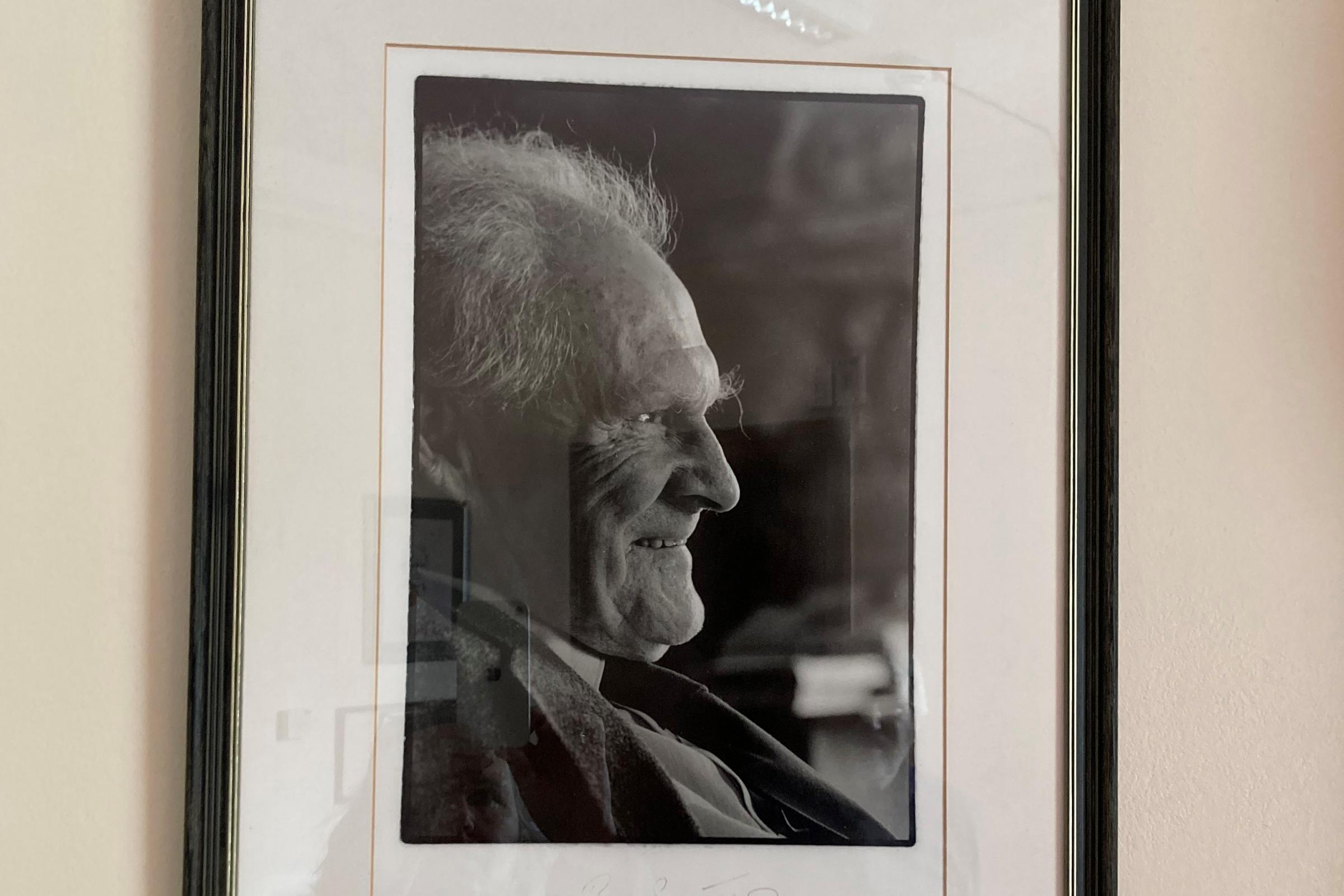One of the photos of R.S. Thomas which hangs on the wall.