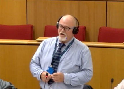 Anglesey County Councillor Jeff Evans raising the phone issue in the council chamber