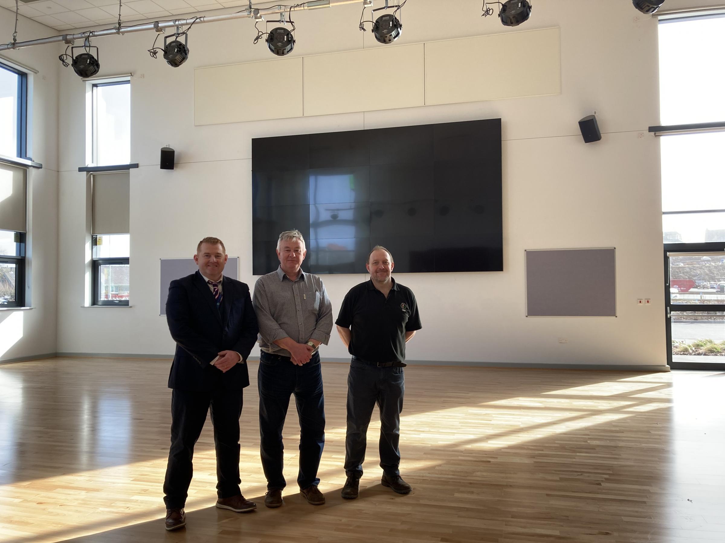 Anglesey County Council Education Officer Owen Davies, Council Deputy Leader Ieuan Williams And Ysgol Corn Hir Head Teacher Rhys Roberts