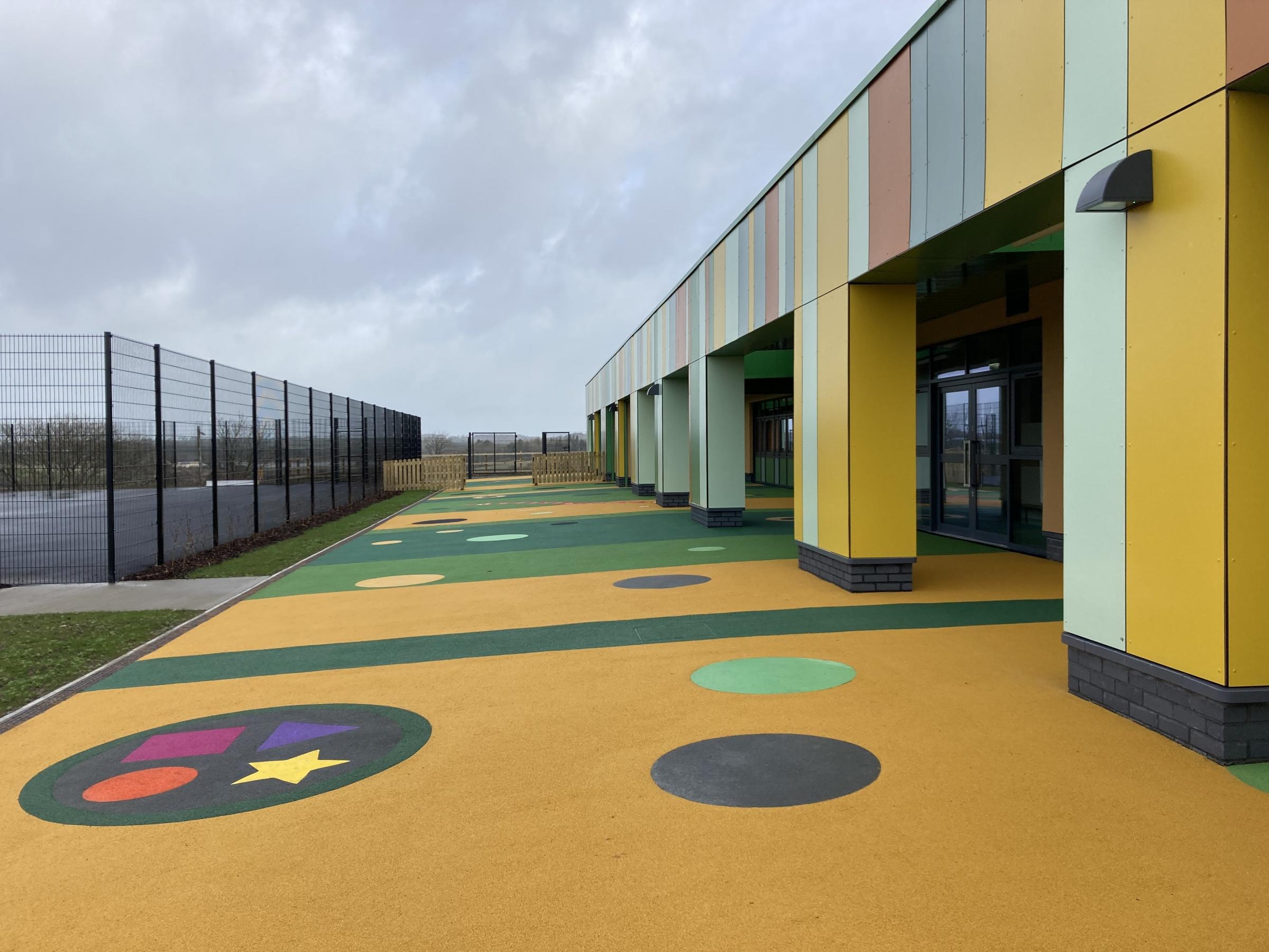 Colourful outside area at the new Ysgol Corn Hir (Image Dale Sprodgeon)