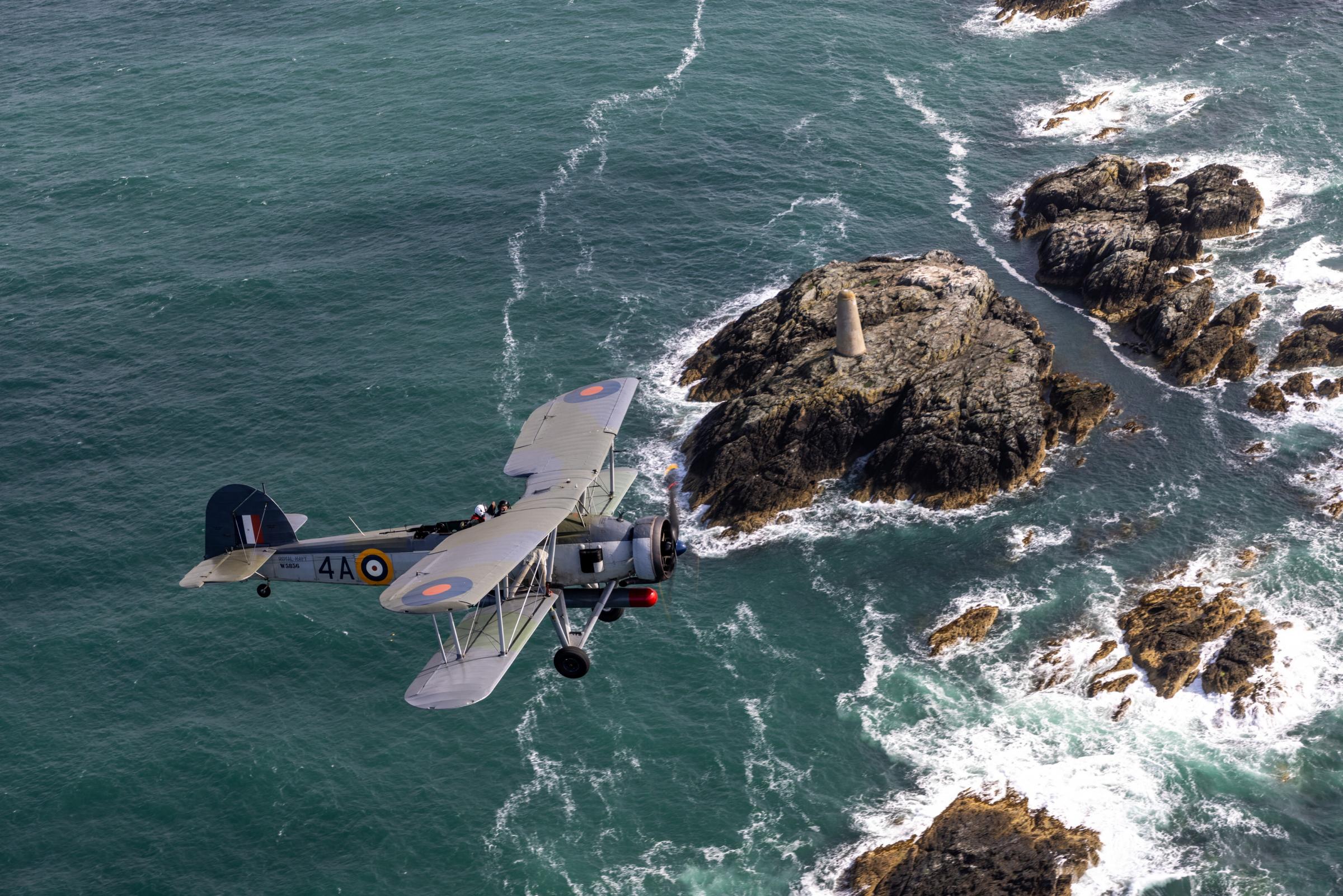 Incredible pictures captured on Friday (11 Aug) show the Navy Wings Swordfish Warbird airplane, W5856, as it participated in the annual RAF Valley Families Day.