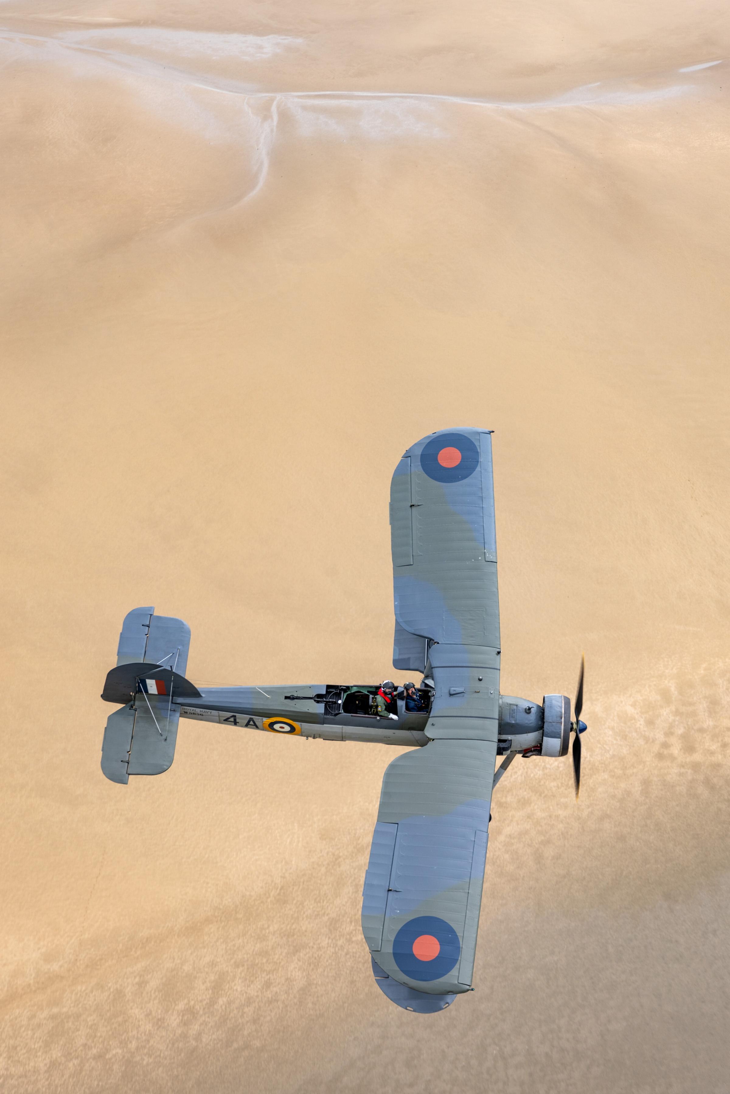 Incredible pictures captured on Friday (11 Aug) show the Navy Wings Swordfish Warbird airplane, W5856, as it participated in the annual RAF Valley Families Day.
