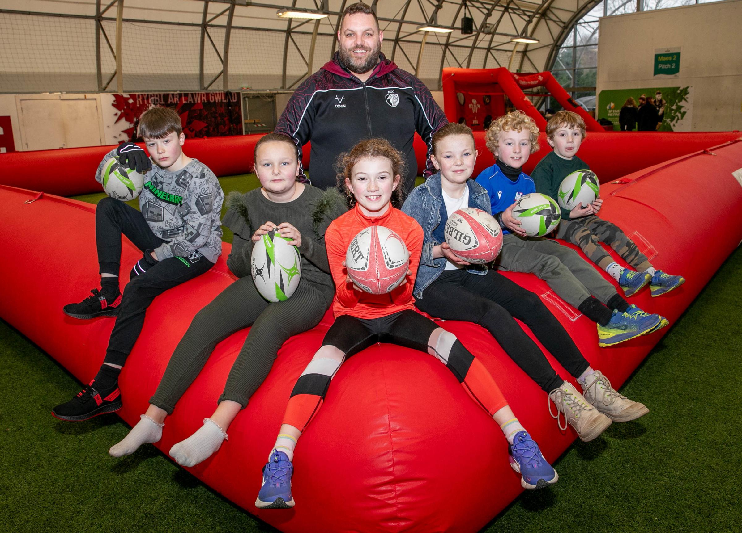 Cartrefi Conwy Sport for Kids event at Eirias Park before the RGC 1404 v Ebbw Vale rugby match Activity leader Jason Craig with Theo Garrathy, Kira Fodan, Zoe James, Kayleigh Fishwick, Joseff James and Ioan James