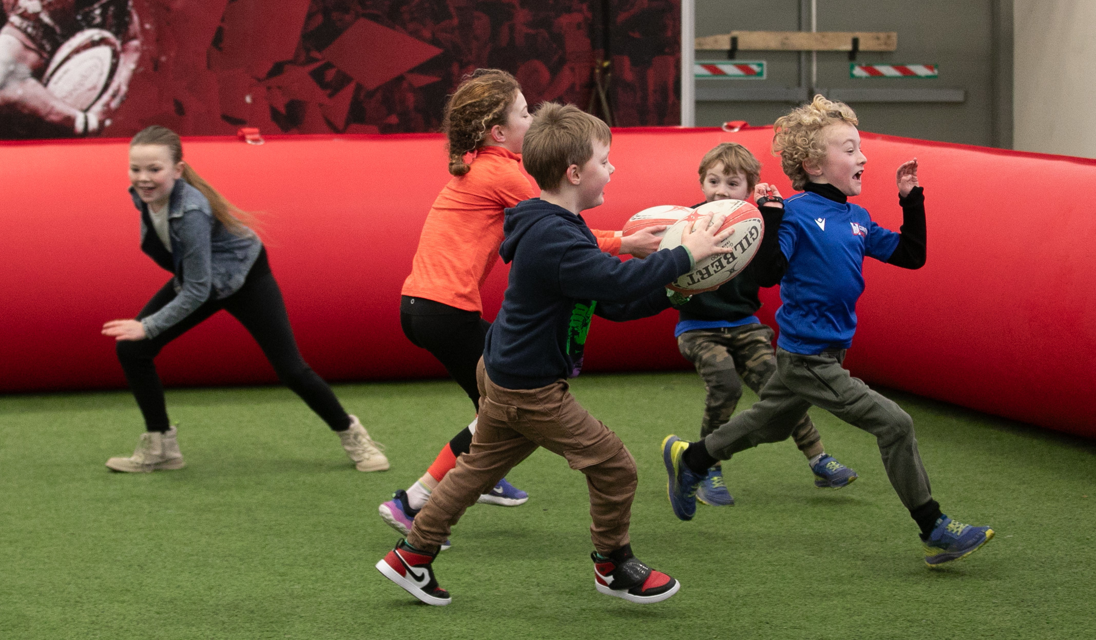 Cartrefi Conwy Sport for Kids event at Eirias Park before the RGC 1404 v Ebbw Vale rugby match Enjoying a rugby tag game