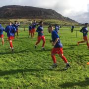 Bangor City warming up before their cup game at Nefyn United