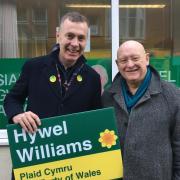 During a visit to Bangor over the weekend, Adam Price addressed the party faithful and took part in the campaigning effort. Pictured with Arfon candidate, Hywel Williams. Image - Plaid Cymru.
