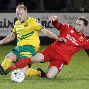 Action from Newtown's clash at Caernarfon Town. Picture by Richard Birch.